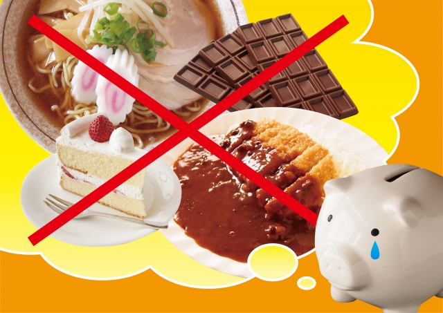 健康に悪そうな食べ物を前に涙するかわいい豚